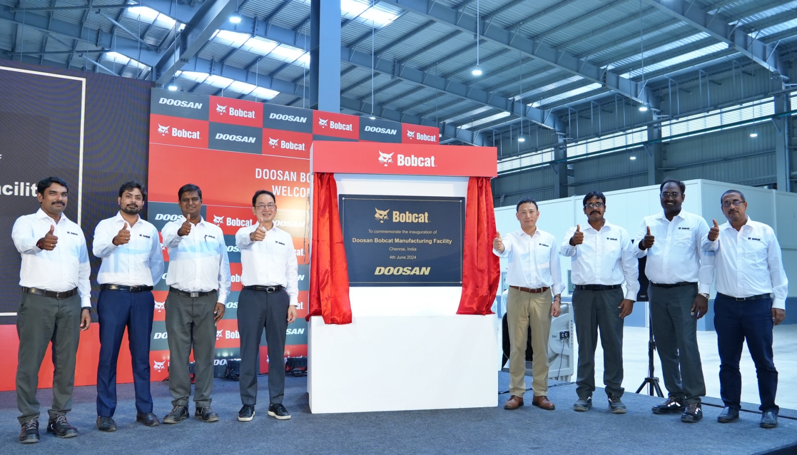 Doosan Bobcat CEO and Vice Chairman Scott Park(fourth from the left) and ALAO President Hyungwon Park(fifth from the left) are capturing a moment of collective achievement, the inauguration of the expansion of the Chennai plant, in a commemorative photo.
